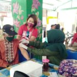 Pelaksanaan Vaksinasi Dosis Kedua di Pasar Bareng kota Malang