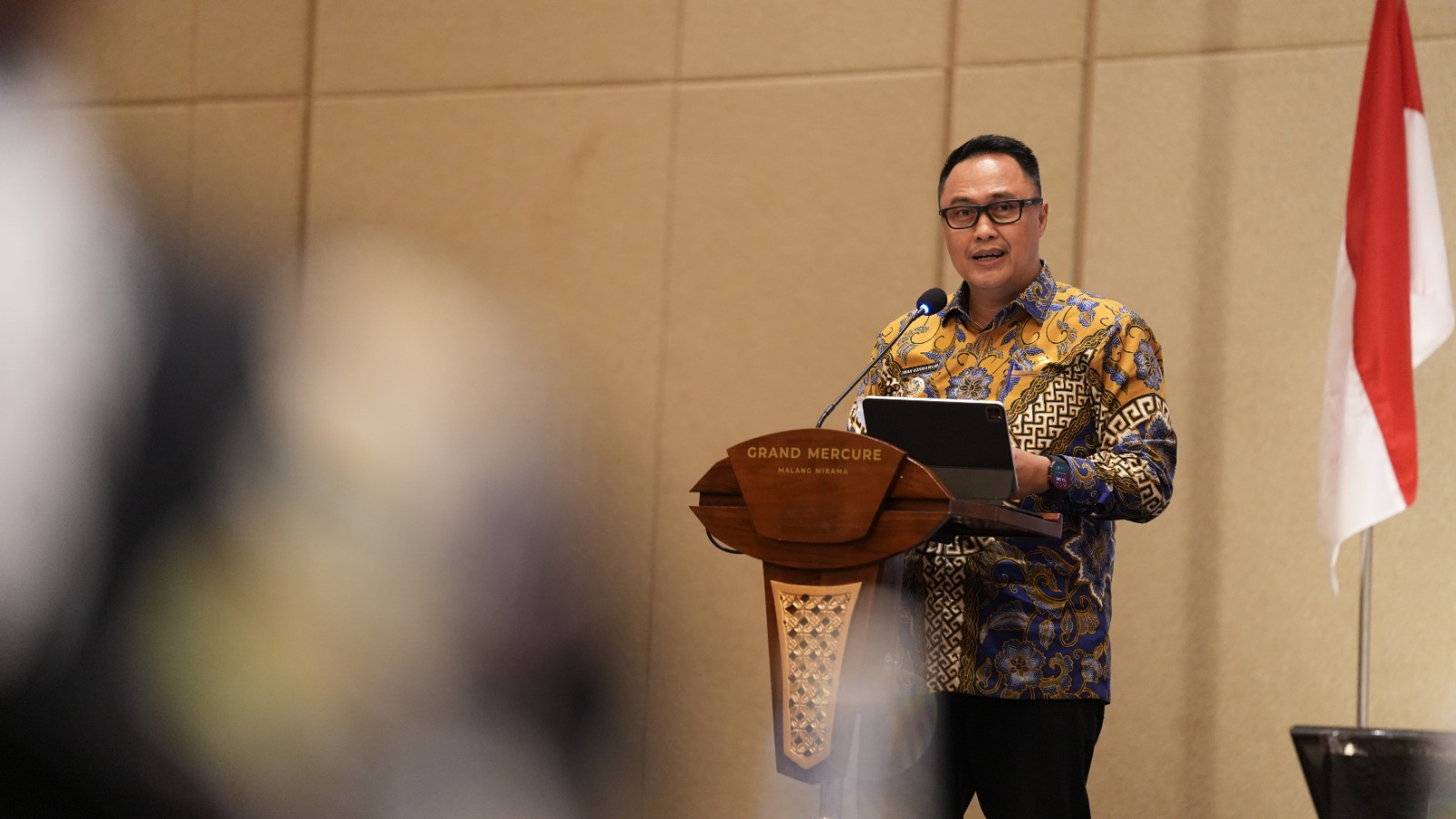 Penjabat (Pj) Wali Kota Malang  Iwan Kurniawan saat memberikan sambutan dalam sebuah momen kegiatan 