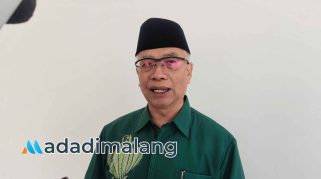 Ketua Tanfidziyah Pengurus Cabang Nahdlatul Ulama (PCNU) Kota Malang, KH. Dr. Isroqunnajah, M.Ag., saat memberikan keterangan kepada awak media (Foto : Agus Yuwono)
